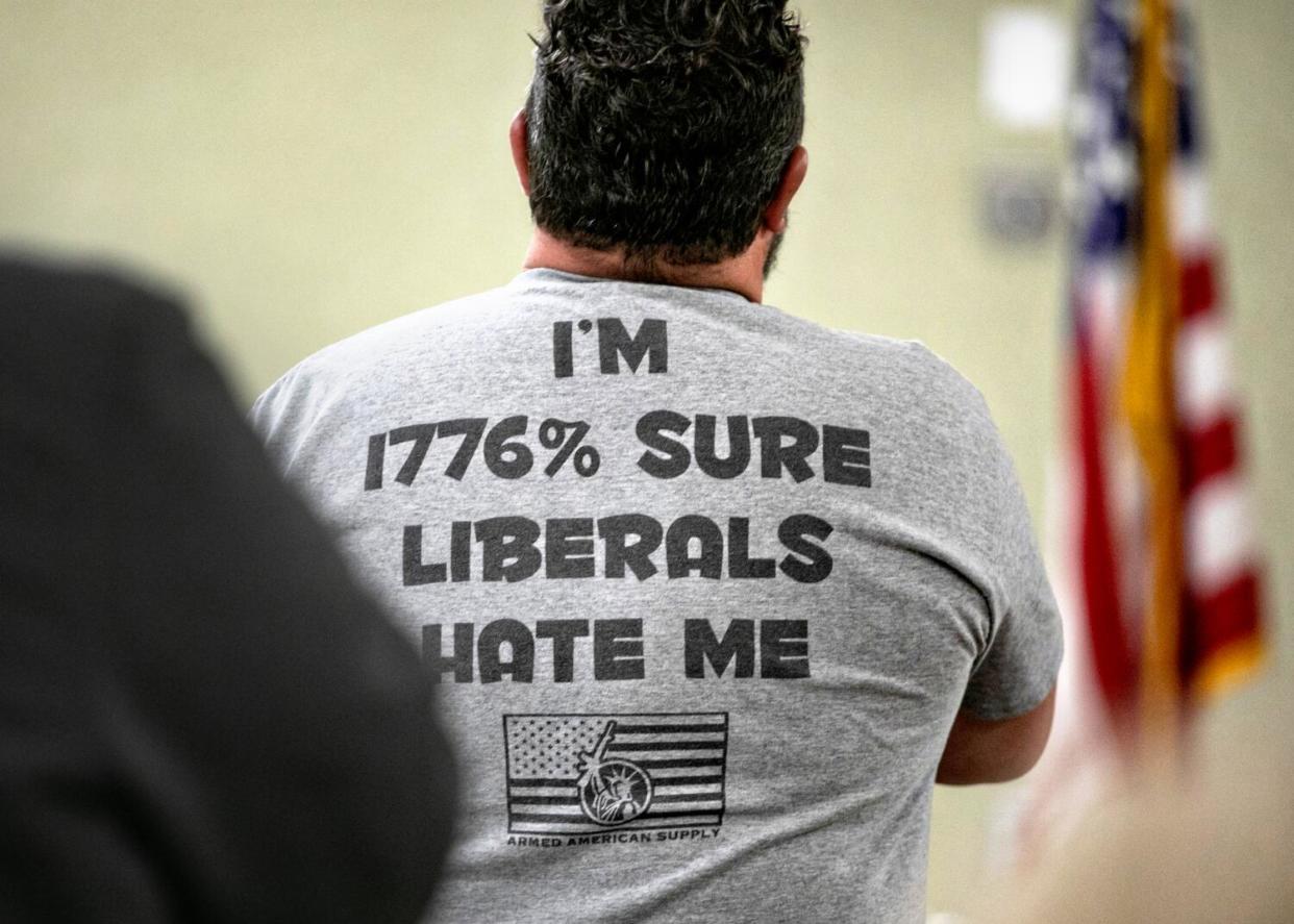 People attend a meeting of the 1776 Sons of Liberty at the Hanford Elks Lodge