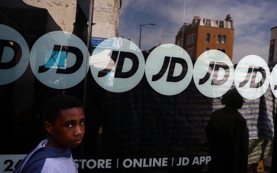 JD Sports has issued a profit warning after it was forced to entice shoppers with promotions