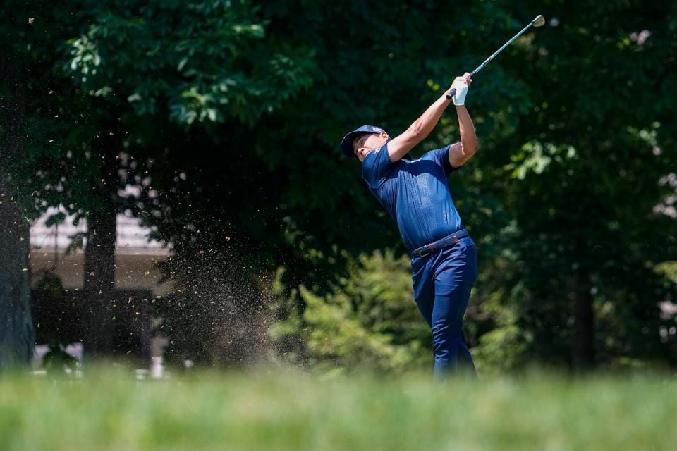 June 2, 2023;  Dublin, Ohio, USA;  Justin Suh tees off the ninth fairway during the second round of the Memorial Tournament at Muirfield Village Golf Club. 