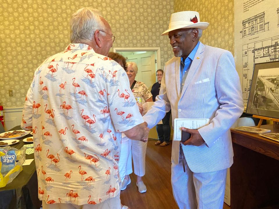 Mayor McGill greets guests at the Fort Smith Museum of History for the centennial celebration of the Garrison bridge.