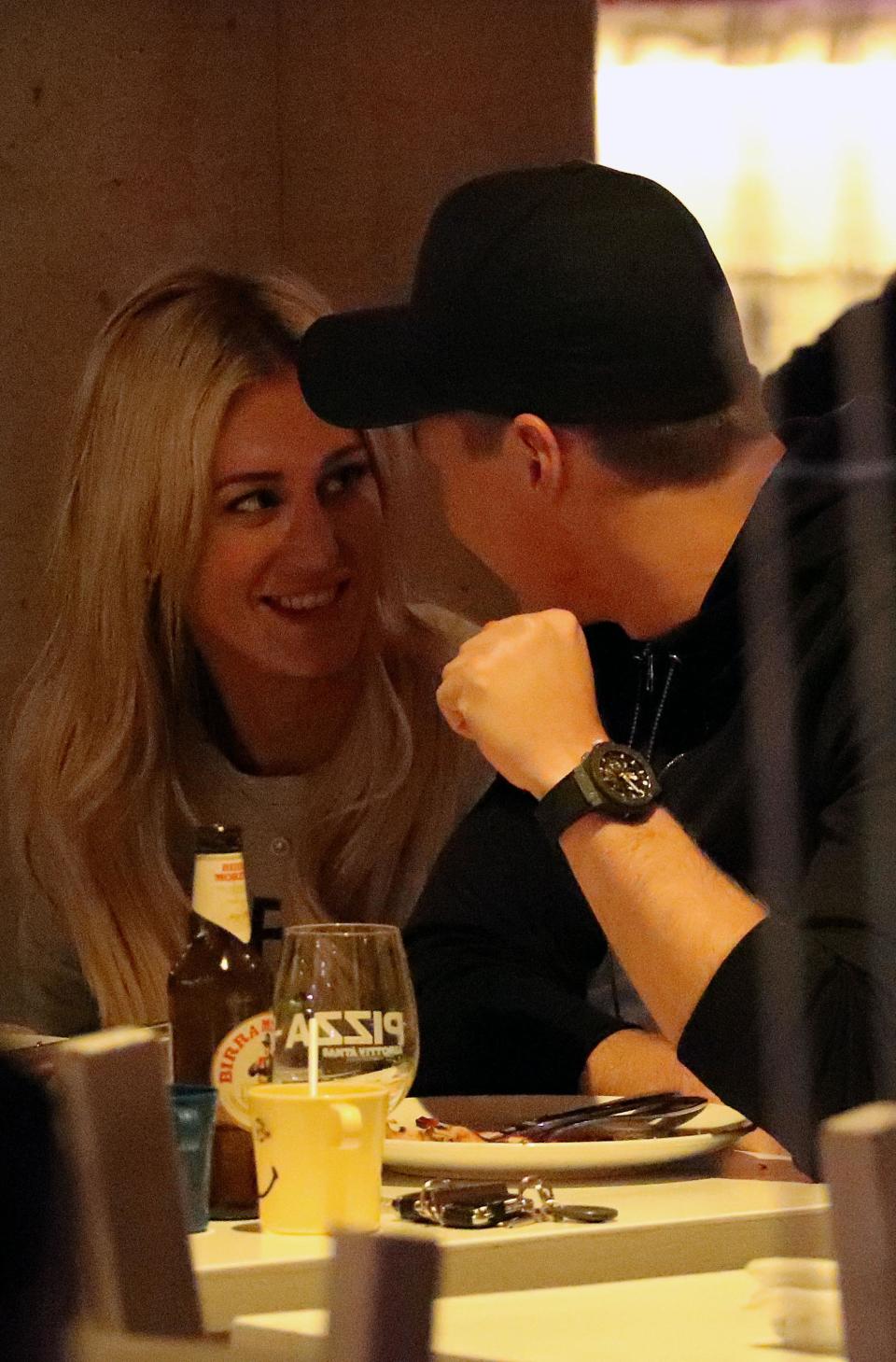 Roxy and Oliver look loved-up as she flashes engagement ring