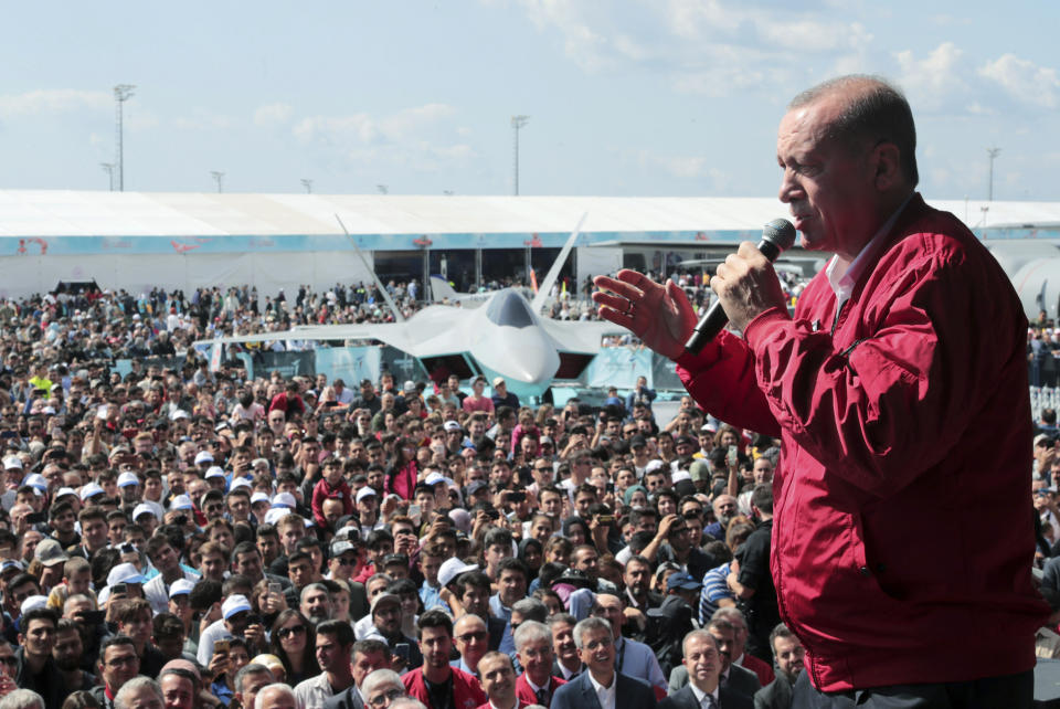 Turkey's President Recep Tayyip Erdogan addresses his supporters at a technology fair in Istanbul, Saturday, Sept. 21, 2019. Erdogan expressed frustration with what he said was the United States' continued support to Syrian Kurdish forces that Turkey regards as terrorists and reiterated that Turkey had completed all preparations for a possible unilateral military operation in northeast Syria, along the Turkish border east of the Euphrates River.(Presidential Press Service via AP, Pool)