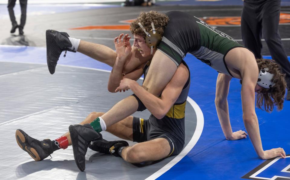 Southern Wyatt Stout works to come out the back door during his 132 lbs bout against Raritan Alexander  Delaurier. Day One at NSIAA Wrestling Championships in Atlantic City on March 2, 2023. 