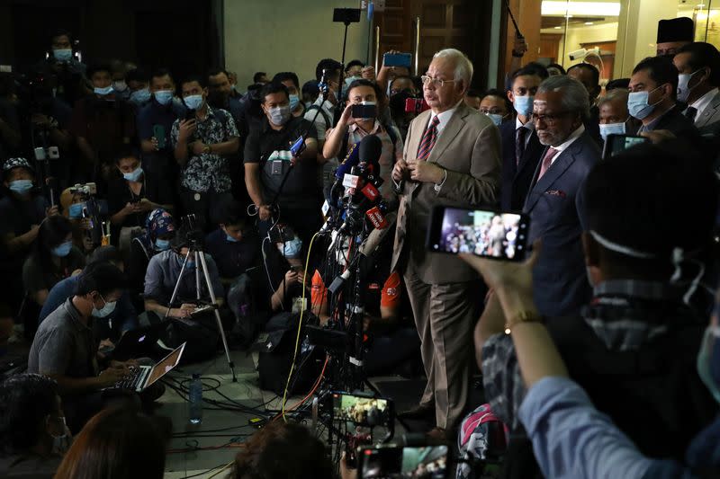 Former Malaysian Prime Minister Najib Razak speaks during a news conference outside Kuala Lumpur High Court in Kuala Lumpur