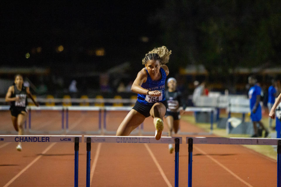 Canyon View's Annaleise Taylor wins girls' 300-meter hurdles at Chandler Rotary Invitational at Chandler High School on March 23, 2024.