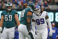 New York Giants' Leonard Williams, right, reacts during the first half of an NFL football game against the Philadelphia Eagles, Sunday, Nov. 28, 2021, in East Rutherford, N.J. (AP Photo/John Munson)