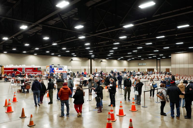 FILE PHOTO: People are inoculated against the coronavirus disease (COVID-19) in Arlington