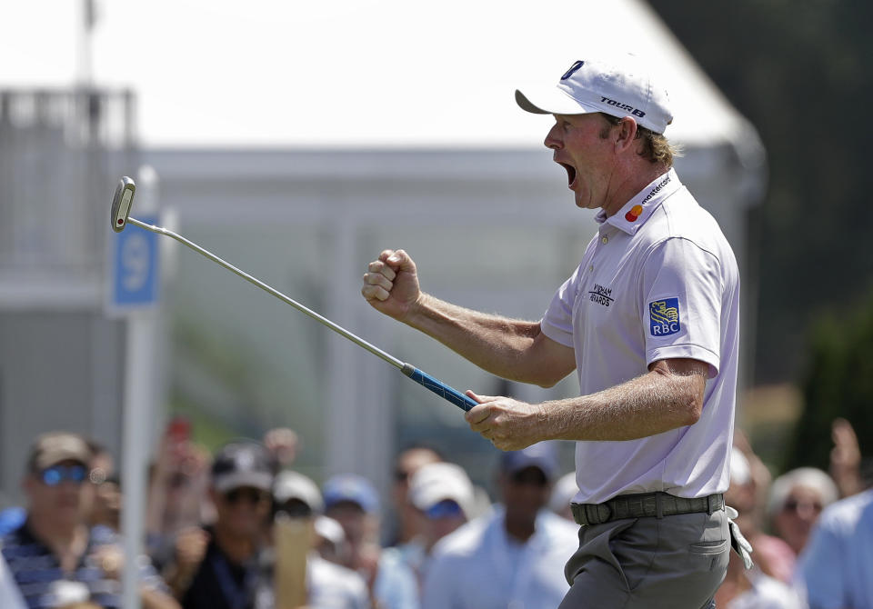 Brandt Snedeker reacts after making a birdie putt on the ninth hole during the first round of the Wyndham Championship golf tournament in Greensboro, N.C., Thursday, Aug. 16, 2018. Sneaker shot a 59 in the first round. (AP Photo/Chuck Burton)