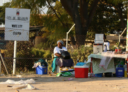 A vendor is seen outside White City Stadium, where Zimbabwe President Emmerson Mnangagwa escaped unhurt after an explosion rocked the stadium, in Bulawayo, Zimbabwe, June 23,2018. REUTERS/Philimon Bulawayo