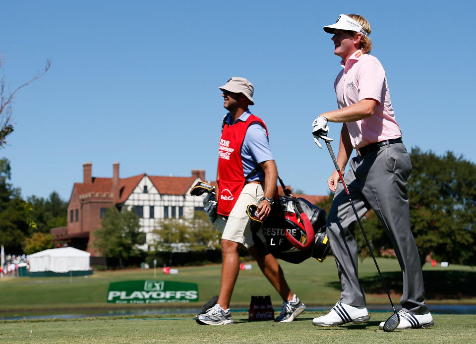 ATLANTA, GA - SEPTEMBER 23: Brandt Snedeker waits on the seventh tee alongside his caddie Scott Vail during the final round of the TOUR Championship by Coca-Cola at East Lake Golf Club on September 23, 2012 in Atlanta, Georgia. (Photo by Kevin C. Cox/Getty Images)