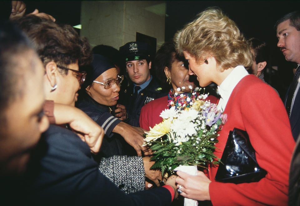 <p>The following day, the royal visited the AIDS unit of Harlem Hospital, and was so moved that she hugged a 7-year-old child who had AIDS.</p> <p>According to a report by the <a href="https://apnews.com/article/86aba3240f517c4c63b49674c0555f7c" rel="nofollow noopener" target="_blank" data-ylk="slk:Associated Press;elm:context_link;itc:0;sec:content-canvas" class="link ">Associated Press</a> at the time, she asked the child, "Are you heavy?" before picking him up ″unrehearsed and of her own volition."</p> <p>In doing so, Diana helped to break the stigma at the time that AIDS could be transmitted through touch. </p>