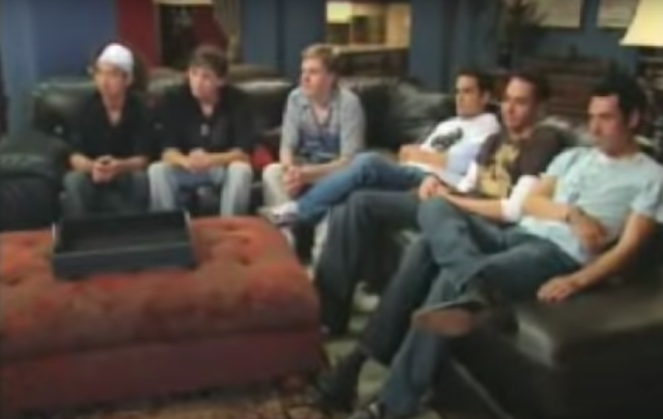 all the contestants sit on a couch