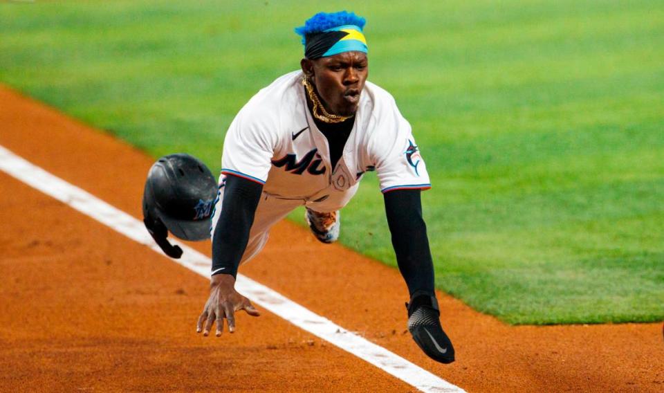 Miami Marlins second baseman Jazz Chisholm Jr. (2) scores during the first inning of a baseball game against the Washington Nationals at LoanDepot Park on Wednesday, May 18, 2022 in Miami, Florida..