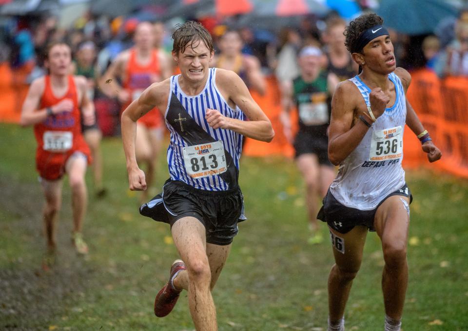 Rockford Christian's Aidan Sosnowski (813) runs through the rain and mud to a 13th-place finish in the Class 1A boys state cross-country meet Saturday, Nov. 5, 2022 at Detweiller Park in Peoria.
