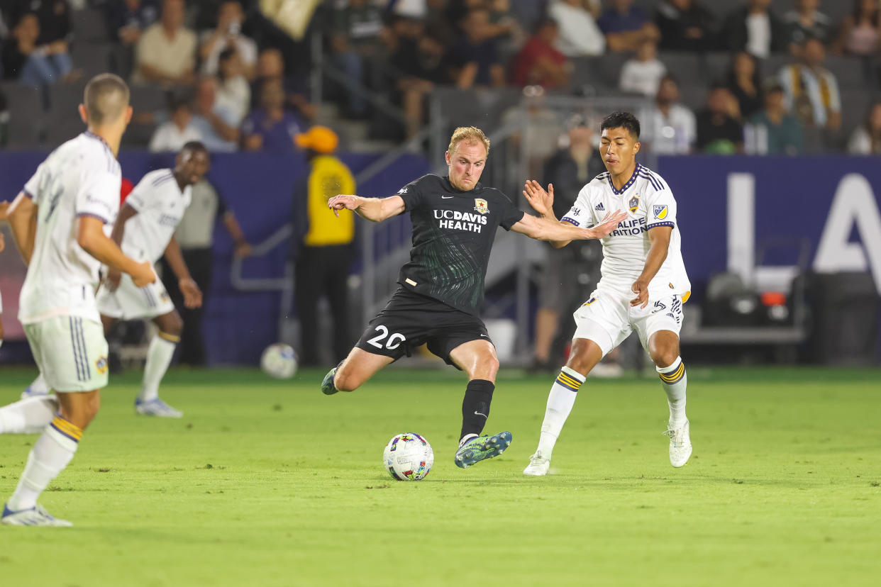 CARSON, CA - JUNE 21: Matt LaGrassa #20 of Sacramento Republic FC passes the ball during a U.S. Open Cup game between Sacramento Republic FC and Los Angeles Galaxy at Diginity Health Sports Park on June 21, 2022 in Carson, California. (Photo by Jenny Chuang/ISI Photos/Getty Images)