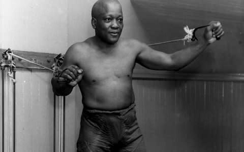 Jack Johnson working out in New York City in 1932 - Credit: AP