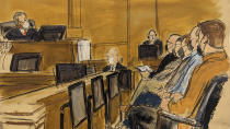 Judge Vernon Broderick, far upper left, addresses the jury foreperson who is seated right holding the verdict form, Monday, March 13, 2023, in New York. A jury said, Monday, it could not reach a unanimous decision on whether to impose the death sentence on the Islamic extremist who killed eight people using a speeding truck on a popular New York bike path. A unanimous verdict is required for a death sentence. (Elizabeth Williams via AP)