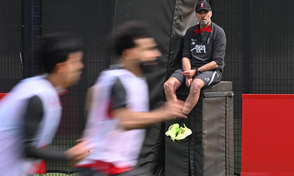 <span>Jürgen Klopp watches on as he puts his overworked <a class="link " href="https://sports.yahoo.com/soccer/teams/liverpool/" data-i13n="sec:content-canvas;subsec:anchor_text;elm:context_link" data-ylk="slk:Liverpool;sec:content-canvas;subsec:anchor_text;elm:context_link;itc:0">Liverpool</a> players through their paces. </span><span>Photograph: John Powell/Liverpool FC/Getty Images</span>