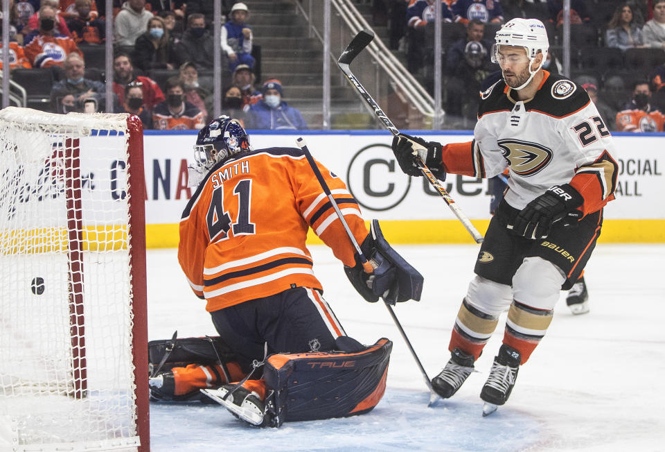 Anaheim Ducks' Kevin Shattenkirk (22) scores on Edmonton Oilers goalie Mike Smith (41) during the first period of an NHL hockey game Tuesday, Oct. 19, 2021, in Edmonton, Alberta. (Jason Franson/The Canadian Press via AP)