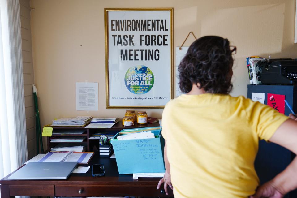 Founder of the grassroots organization, Environmental Justice Task Force, Linda Shosie, stands at her desk in her home on July 15, 2022 in Tucson, AZ.