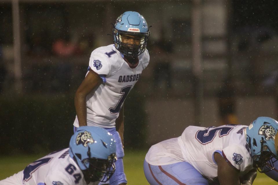 Gadsden County sophomore quarterback Shawnterris  Thomas (1) calls out a play in a game against Lincoln on Sept. 9, 2022, at Gene Cox Stadium. The Trojans won 33-0.