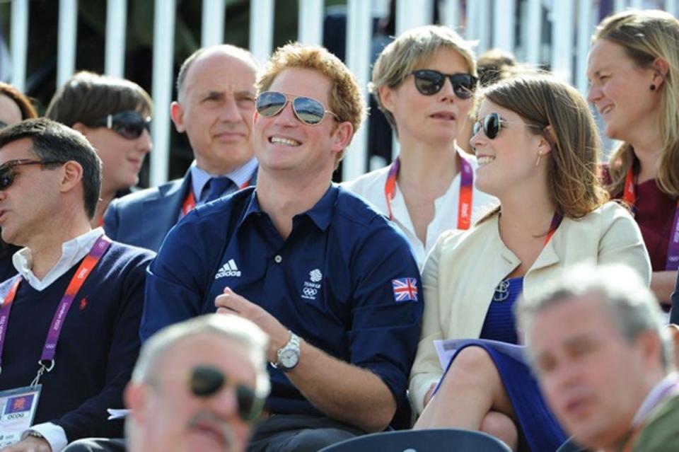 Shady pair: Prince Harry and his cousin Princess Eugenie in sunglasses in Greenwich (PA)