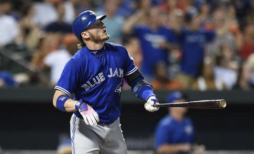 Toronto Blue Jays' Josh Donaldson watches his solo home run against the Baltimore Orioles in the fourth inning of a baseball game, Monday, Aug. 29, 2016, in Baltimore. (AP Photo/Gail Burton)