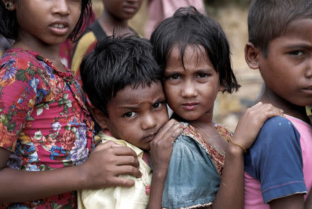 Rohingya refugee children queue for aid in Cox's Bazar, Bangladesh, September 21, 2017. REUTERS/Cathal McNaughton