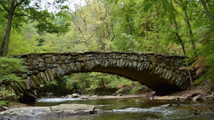 <span class="article__caption">Boulder Bridge in Rock Creek Park</span> (Photo: RHW Photography/Getty)