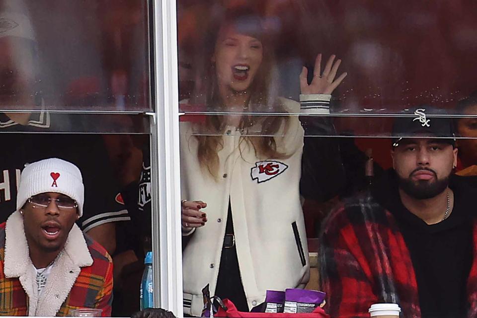 <p> Jamie Squire/Getty</p> Taylor Swift wearing her Jeff Hamilton-designed Chiefs jacket.