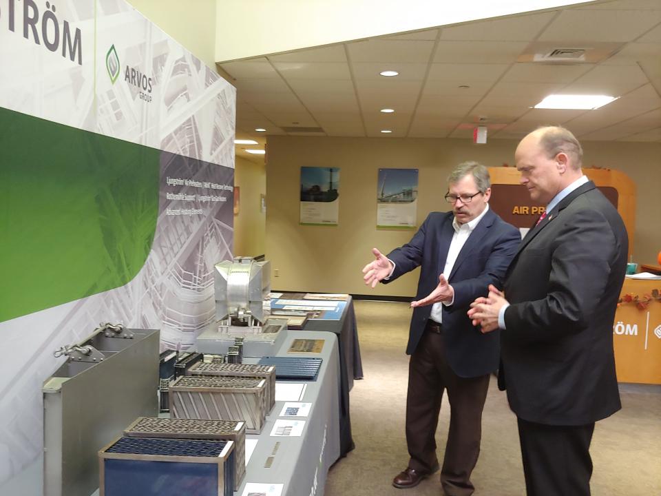 Ljungstrom Director of Project Development Tom Hennessy, left, gives Rep. Tom Reed a tour of the Wellsville facility in October 2018.