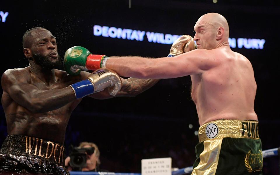 Wilder and Fury are set to meet again in February - AP