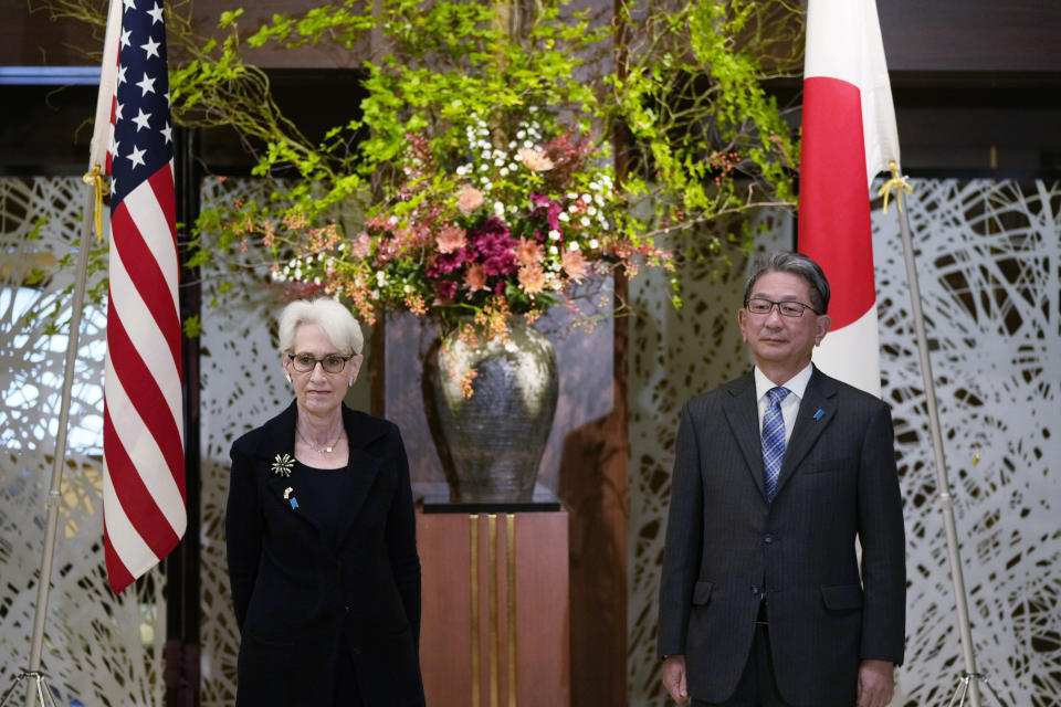 U.S. Deputy Secretary of State Wendy Sherman, left, and her counterpart, Japanese Vice Foreign Minister Takeo Mori pose for a photo before their meeting at the Iikura guesthouse in Tokyo, Tuesday, Oct. 25, 2022. (AP Photo/Hiro Komae)