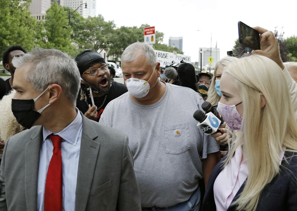 Ohio House Speaker Larry Householder walks out of U.S. District Court after charges that he participated in a racketeering conspiracy in Columbus, Ohio on July 21, 2020.