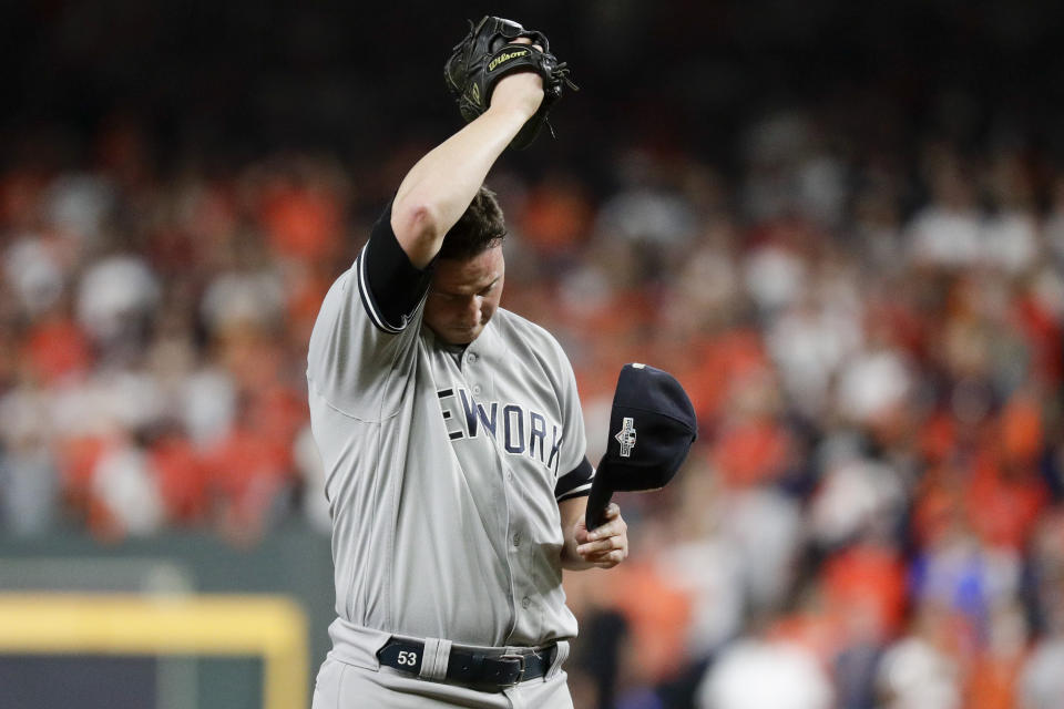 New York Yankees relief pitcher Zack Britton reacts after loading the bases against the Houston Astros during the eighth inning in Game 6 of baseball's American League Championship Series Saturday, Oct. 19, 2019, in Houston. (AP Photo/Eric Gay)