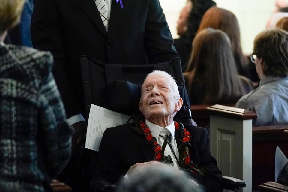 Former President Jimmy Carter greets people as he leaves after the funeral service for his wife, former first lady Rosalynn Carter, at Maranatha Baptist Church, Wednesday, Nov. 29, 2023, in Plains, Ga. The former first lady died on Nov. 19. She was 96. (AP Photo/Alex Brandon, Pool)