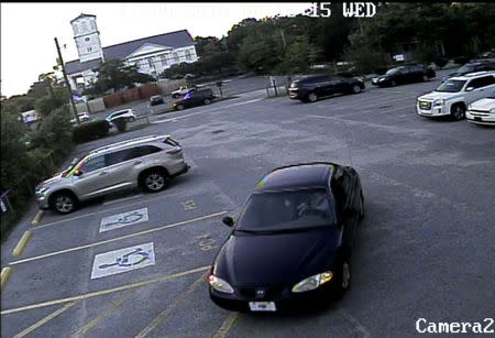 A car which police believe belongs to a suspect which police are searching for in connection with the shooting of several people at a church in Charleston, South Carolina is seen in a still image from CCTV footage released by the Charleston Police Department June 18, 2015. REUTERS/Charleston Police Department/Handout via Reuters