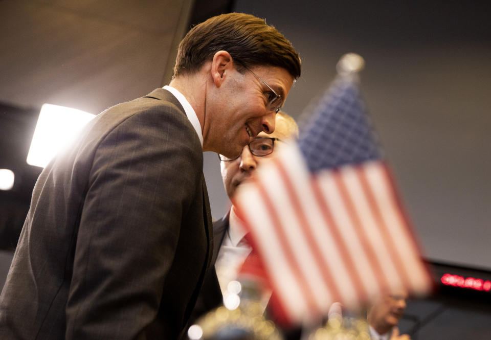 U.S. Secretary for Defense Mark Esper, left, speaks with Croatian Defense Minister Damir Krsticevic during a meeting of the North Atlantic Council at NATO headquarters in Brussels, Wednesday, Feb. 12, 2020. NATO ministers, in a two-day meeting will discuss building stability in the Middle East, the Alliance's support for Afghanistan and challenges posed by Russia's missile systems. (AP Photo/Virginia Mayo)