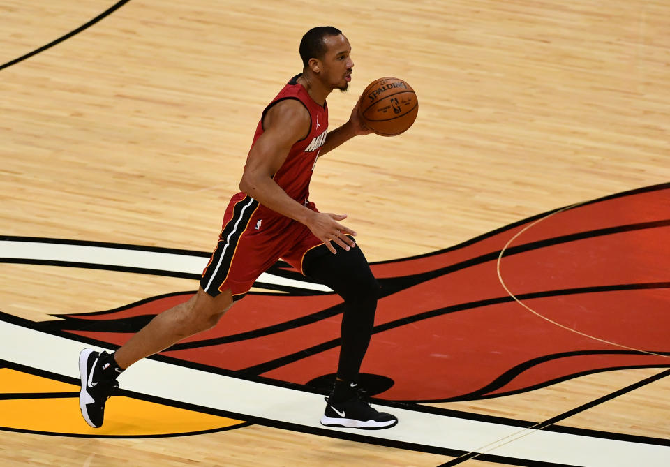 Dec 25, 2020; Miami, Florida, USA; Miami Heat guard Avery Bradley (11) dribbles the ball against the New Orleans Pelicans during the second half at American Airlines Arena. 