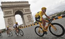 Chris Froome wins fourth Tour de France after Champs Élysées procession