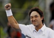 Go Soeda of Japan celebrates after defeating Elias Ymer of Sweden during their men's singles first round match at the Australian Open 2015 tennis tournament in Melbourne January 20, 2015. REUTERS/Carlos Barria (AUSTRALIA - Tags: SPORT TENNIS)