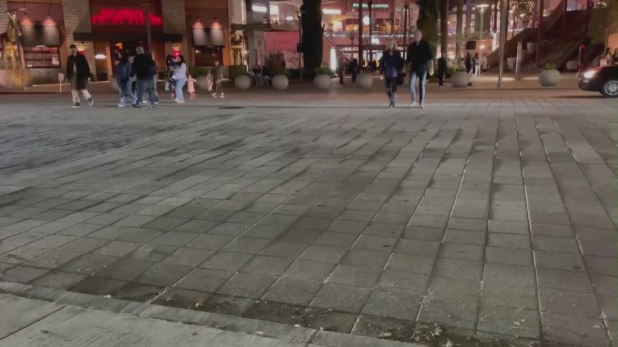 The crosswalk where Absalom Wilkins was left bloodied and bruised after armed suspects robbed him at gunpoint at the Del Amo Fashion Center on Dec. 23, 2023. (KTLA)