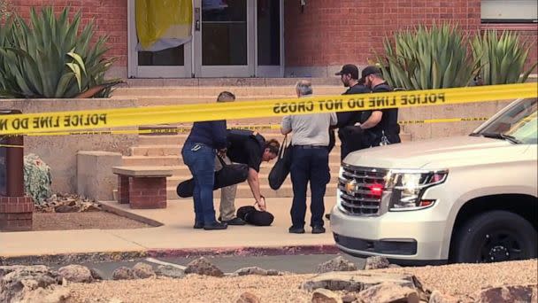 PHOTO: In this screen grab from a video, police work near the scene where a person was killed on the University of Arizona campus in Tucson, Ariz. (KGUN)