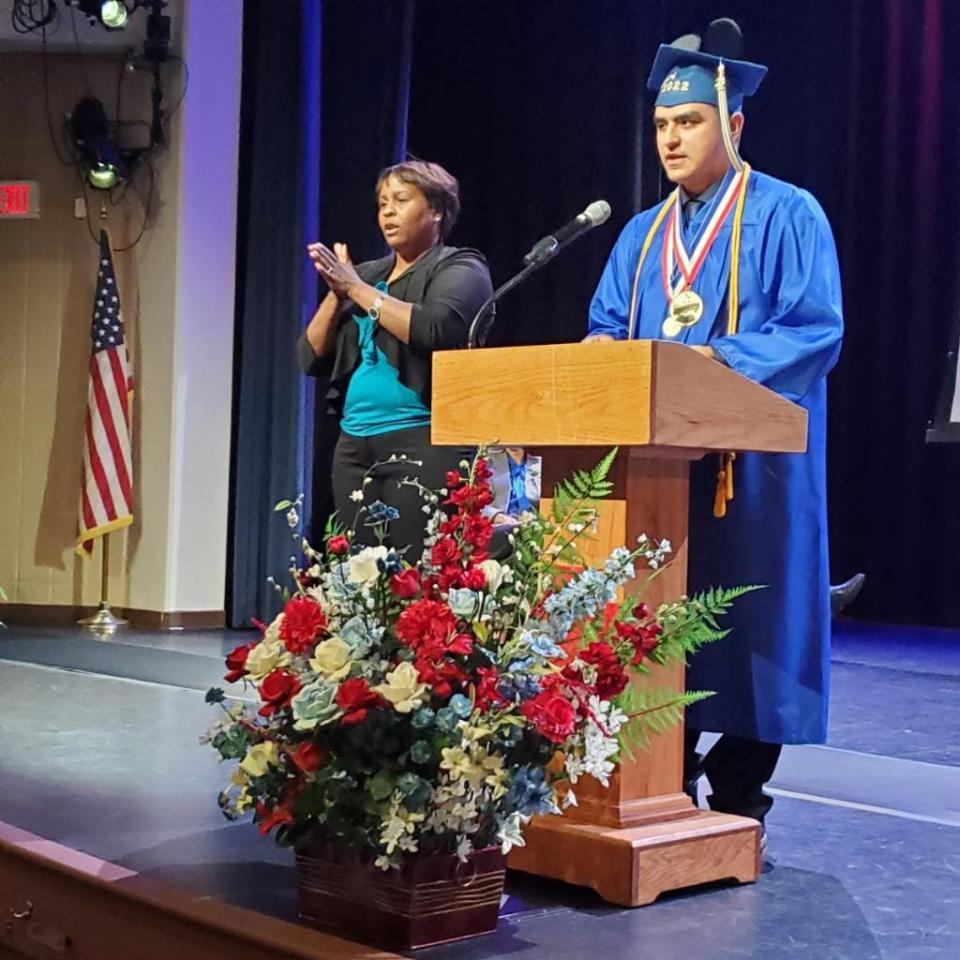 John Montes, co-salutatorian of the Class of 2022 blind class at the Florida School for the Deaf and the Blind, addresses the audience.