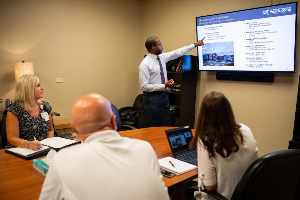 Dr. Keith Gray, center, goes over hospital statistics during a meeting at the University of Tennessee Medical Center in Knoxville on Wednesday, July 12, 2023. Dr. Gray is the UT Medical Center president and will replace Joseph Landsman Jr. as CEO on April 1, 2024 when Landsman retires.