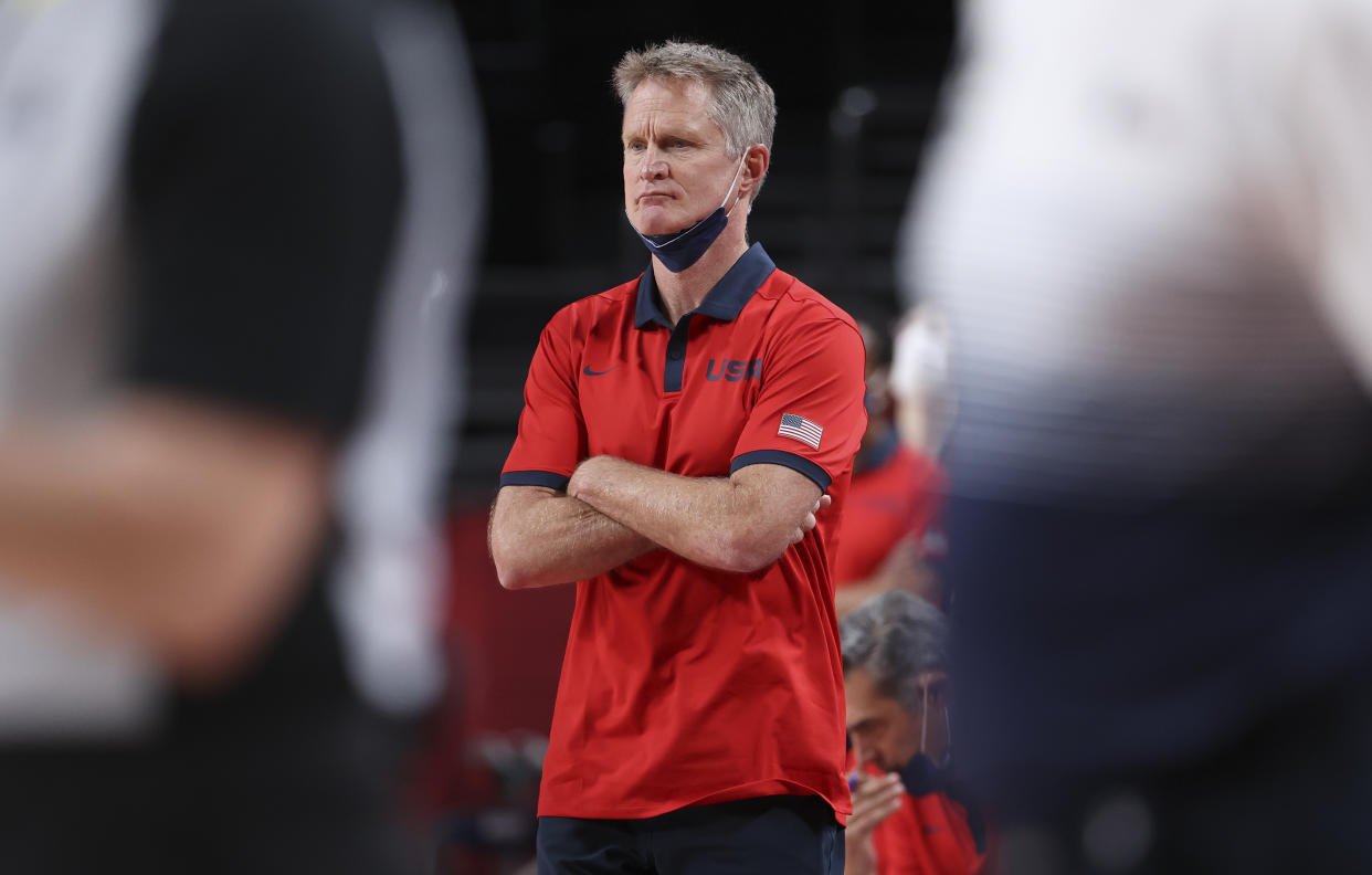 Steve Kerr stands on the sideline during a Team USA game.