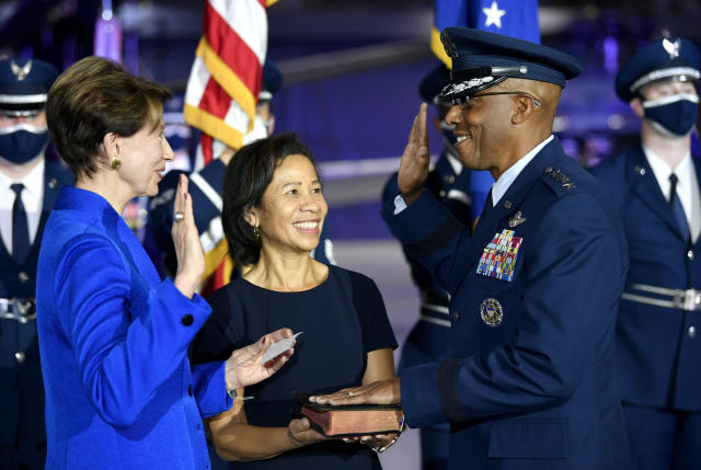 In this image provided by the U.S. Air Force, Secretary of the Air Force Barbara Barrett administers the oath of office to incoming Air Force Chief of Staff Gen. CQ Brown Jr. during the ceremony at Joint Base Andrews, Md., on Aug. 6, 2020. Brown is the 22nd Chief of Staff of the Air Force. (Wayne Clark/U.S. Air Force via AP)