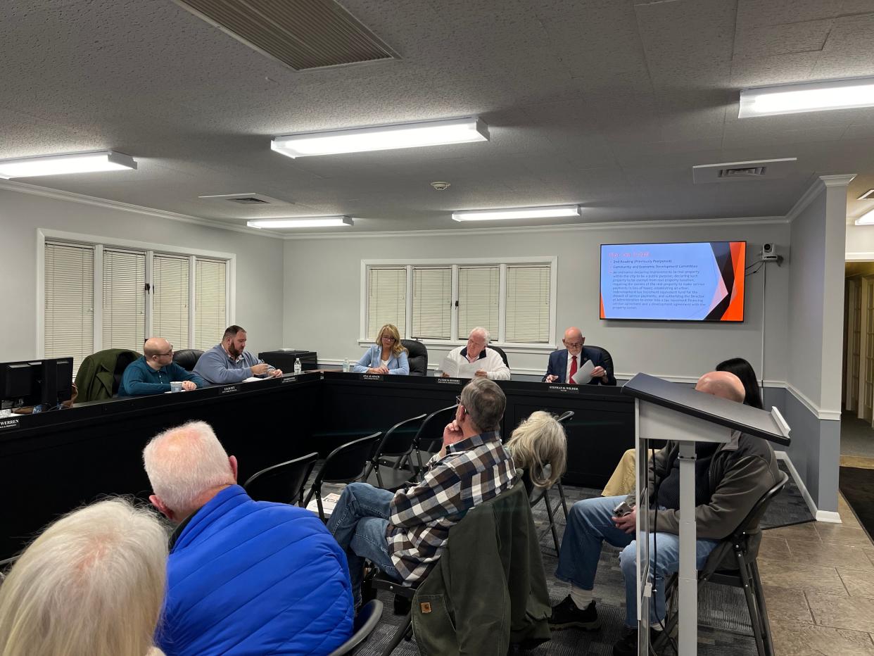 Patrick DeOrio, North Canton's administrator briefs North Canton council Monday night about the status of discussions with Maple Street Commerce on a tax-break agreement to re-develop the former Hoover west factory.