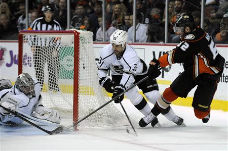 Jan 23, 2014; Anaheim, CA, USA; Anaheim Ducks left wing Pat Maroon (62) scores a goal on Los Angeles Kings goalie Jonathan Quick (32) during the second period at Honda Center. Mandatory Credit: Kelvin Kuo-USA TODAY Sports