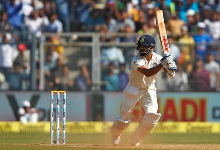 Cricket - India v England - Fourth Test cricket match - Wankhede Stadium, Mumbai, India - 11/12/16. India's Virat Kohli plays a shot. REUTERS/Danish Siddiqui